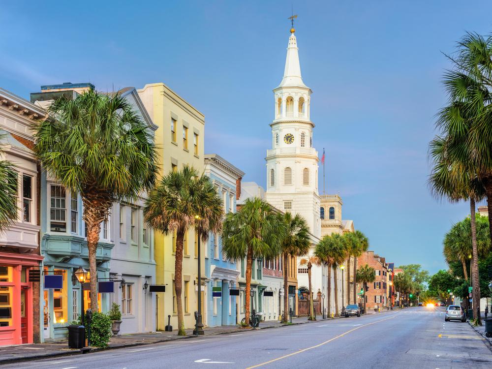 Street in Charleston with very colorful building. 